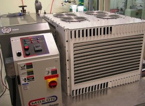 Engineering researchers at Oregon State University developed a prototype thermally activated cooling system that converts waste heat to cooling.  (Credit: OSU)